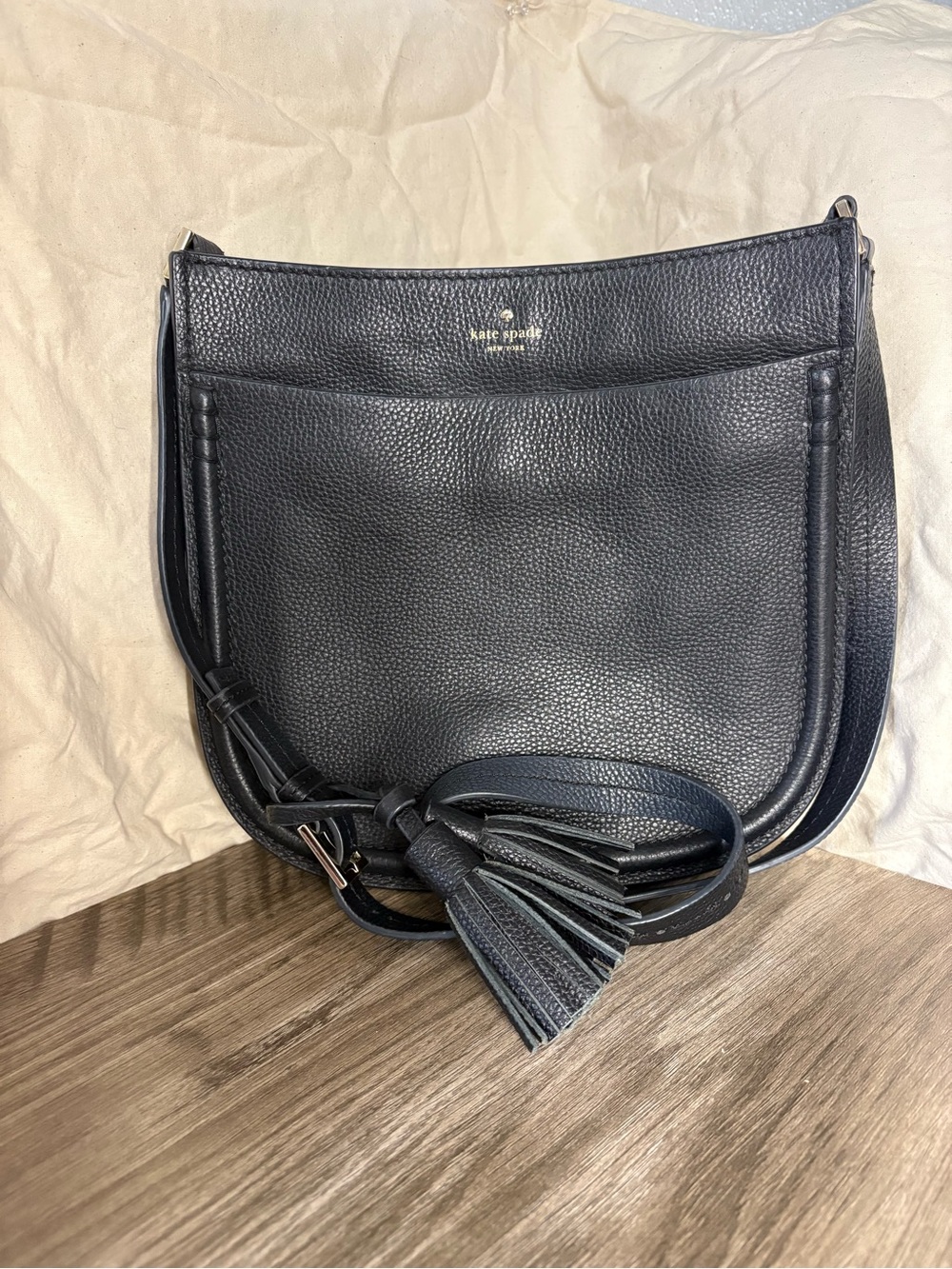Kate Spade black pebbled leather crossbody with tassel - Picture 1 of 4